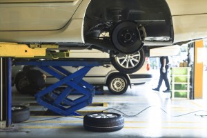 car wheel  suspension and brake system maintenance in auto service