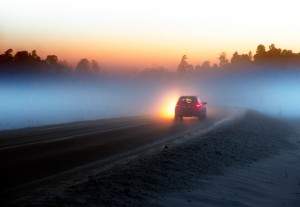 Image - Car on country road at night in winter.