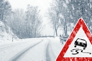 imge - icy, slick, snow-packed country road with icy road warning sign