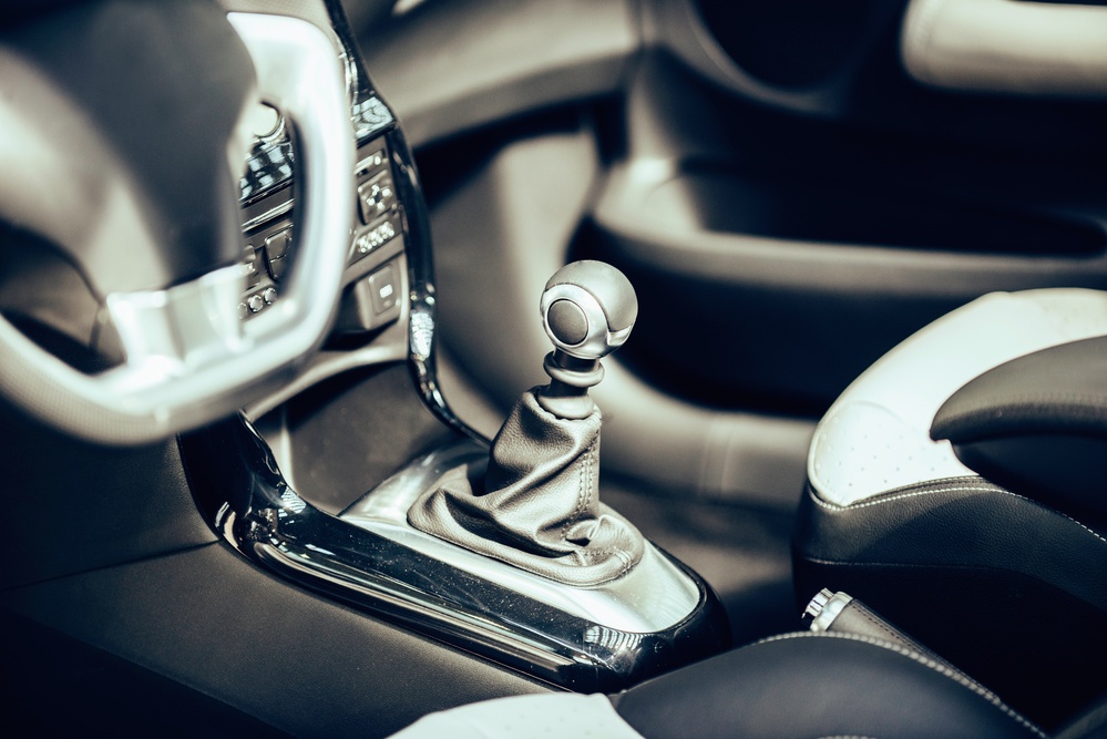 image of stick shift in a vehicle